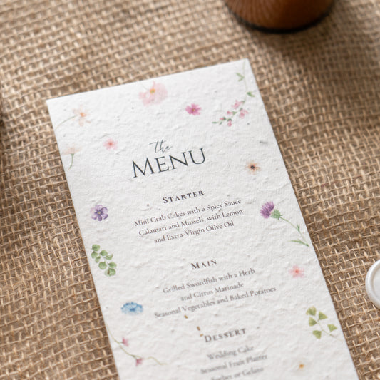 seeded wedding menus, plantable wedding menus, eco friendly wedding menus, biodegradable wedding menus, seeded paper menus, sustainable wedding stationery, wildflower seeded menus, eco wedding menus, zero waste wedding menus, green wedding ideas, rustic wedding menus, floral seeded menus, plantable paper menus, compostable wedding menus, eco conscious wedding stationery