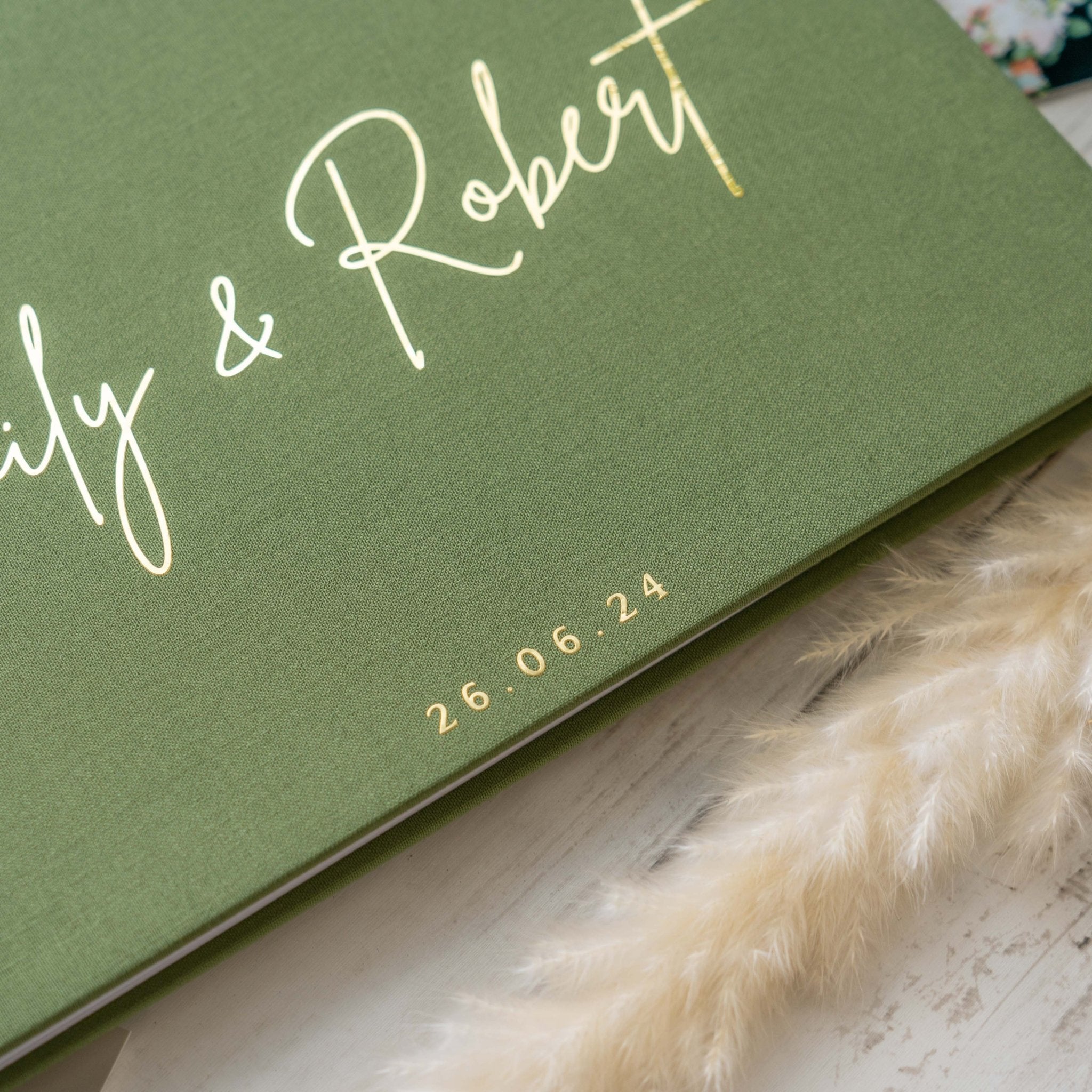 Custom wedding guest book with couple names printed on premium cover