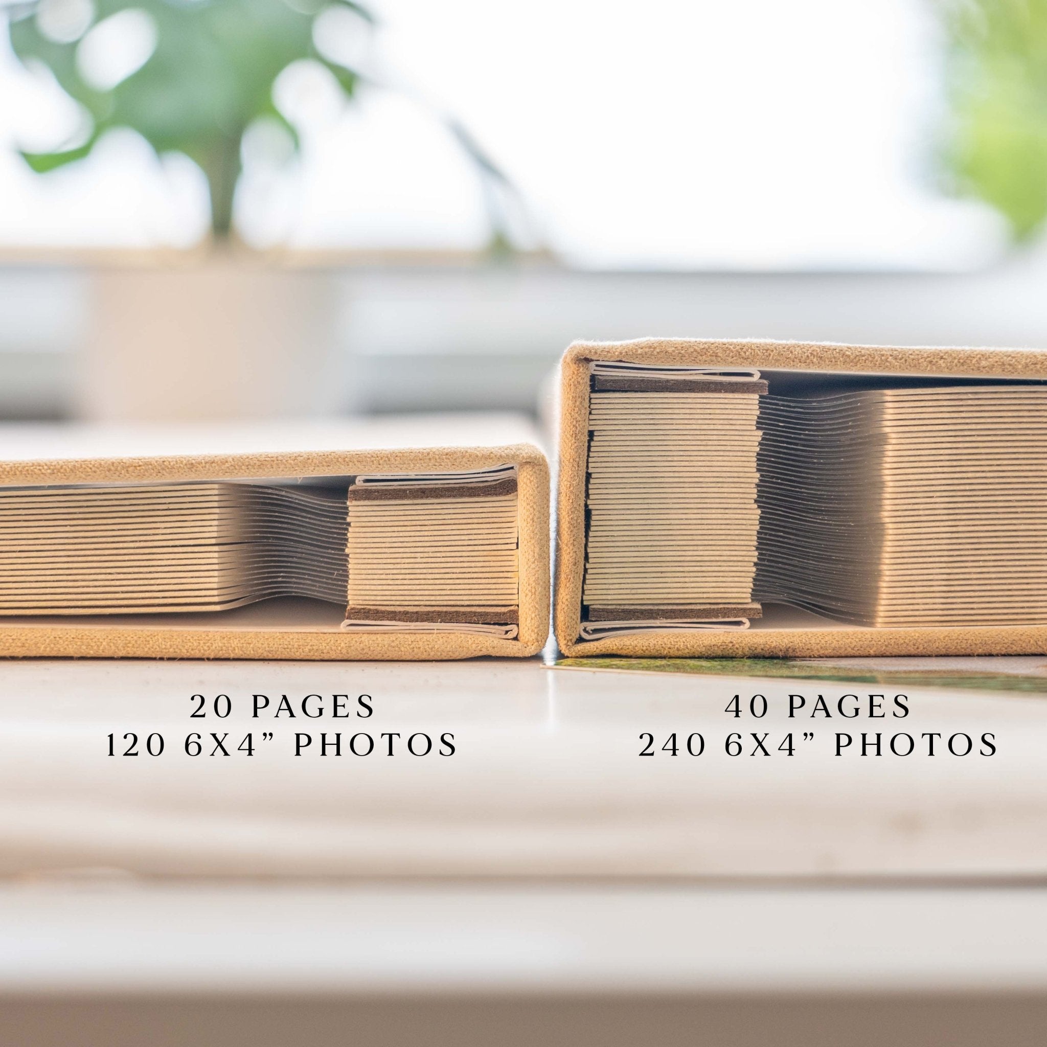 two photo albums lay down next to eachother