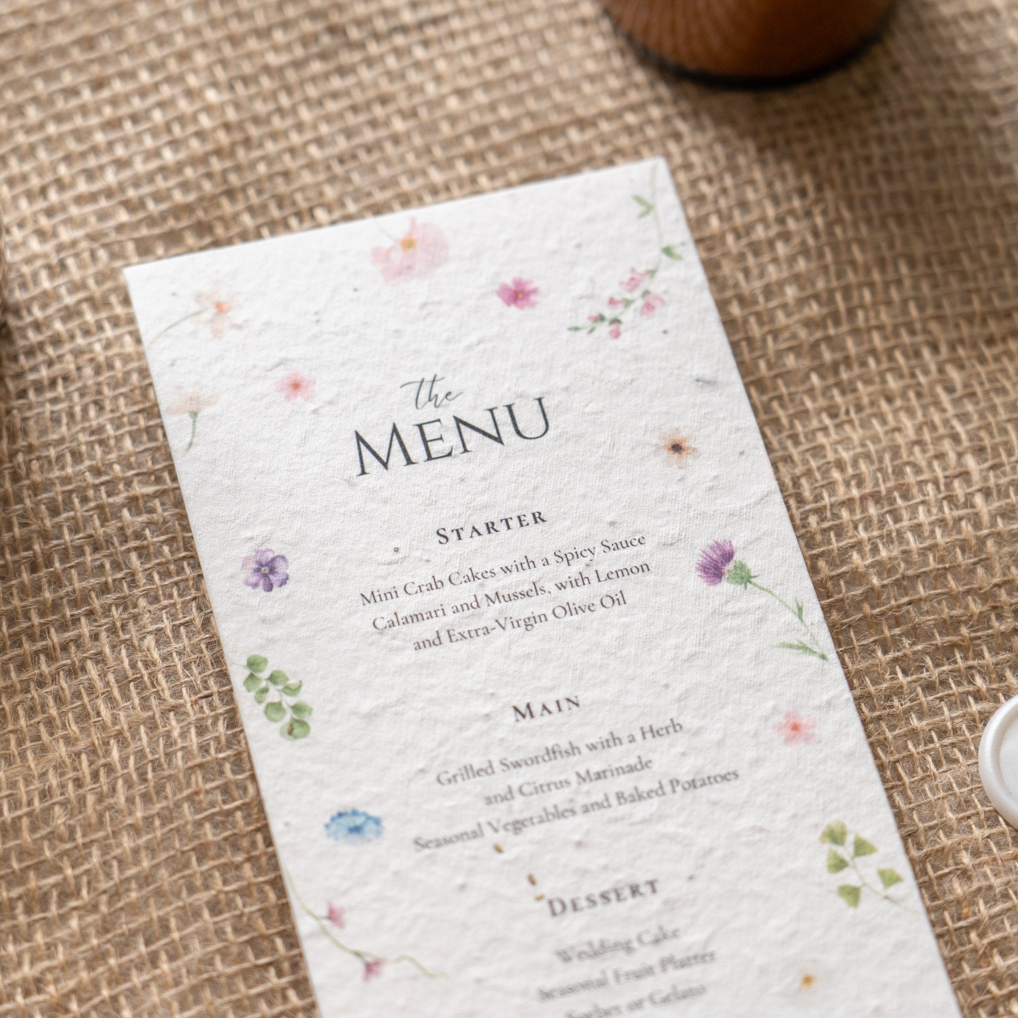 seeded wedding menus, plantable wedding menus, eco friendly wedding menus, biodegradable wedding menus, seeded paper menus, sustainable wedding stationery, wildflower seeded menus, eco wedding menus, zero waste wedding menus, green wedding ideas, rustic wedding menus, floral seeded menus, plantable paper menus, compostable wedding menus, eco conscious wedding stationery