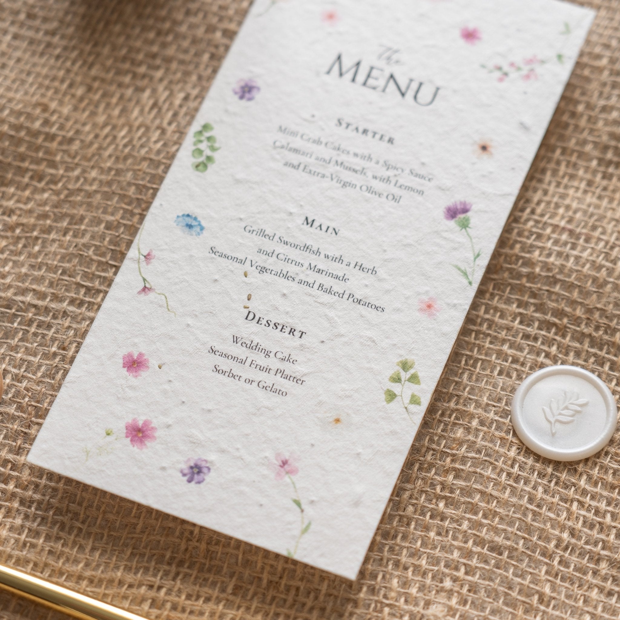 seeded wedding menus, plantable wedding menus, eco friendly wedding menus, biodegradable wedding menus, seeded paper menus, sustainable wedding stationery, wildflower seeded menus, eco wedding menus, zero waste wedding menus, green wedding ideas, rustic wedding menus, floral seeded menus, plantable paper menus, compostable wedding menus, eco conscious wedding stationery