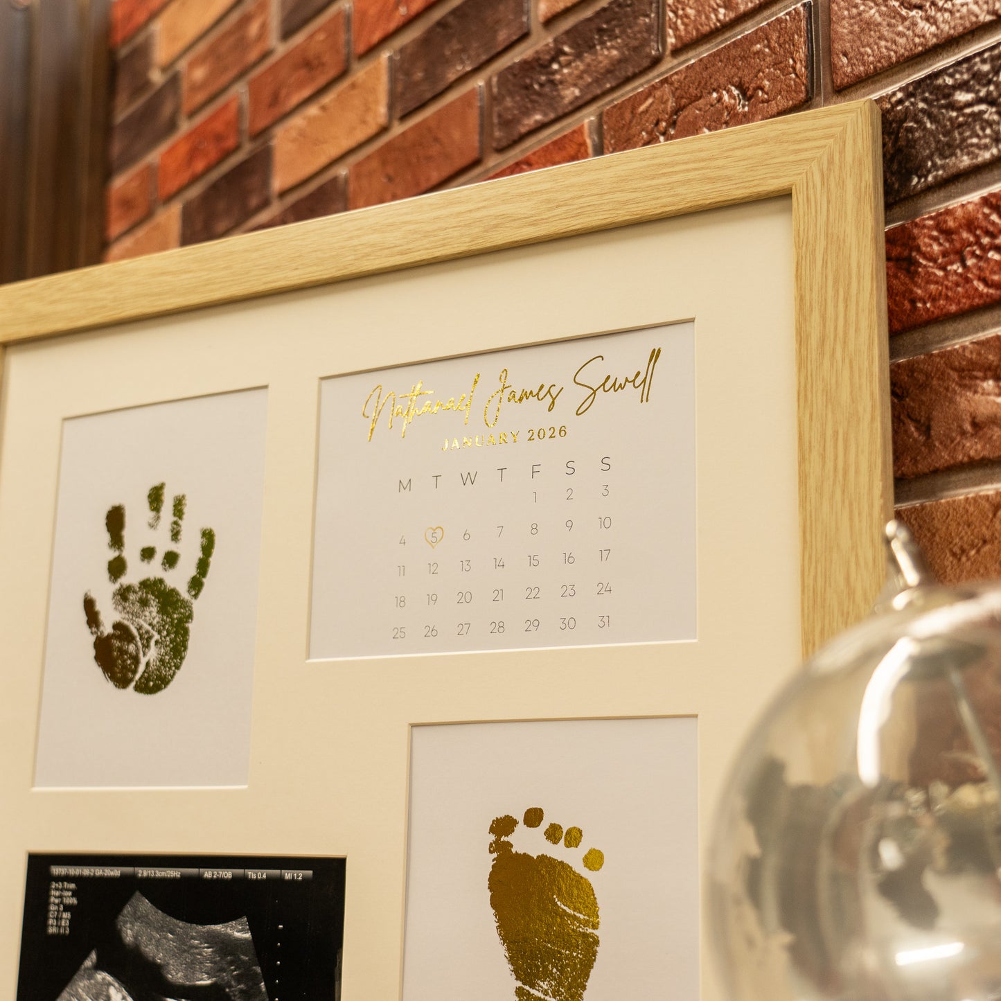 Nursery decor baby foil frame with ultrasound image, metallic gold handprint and footprint