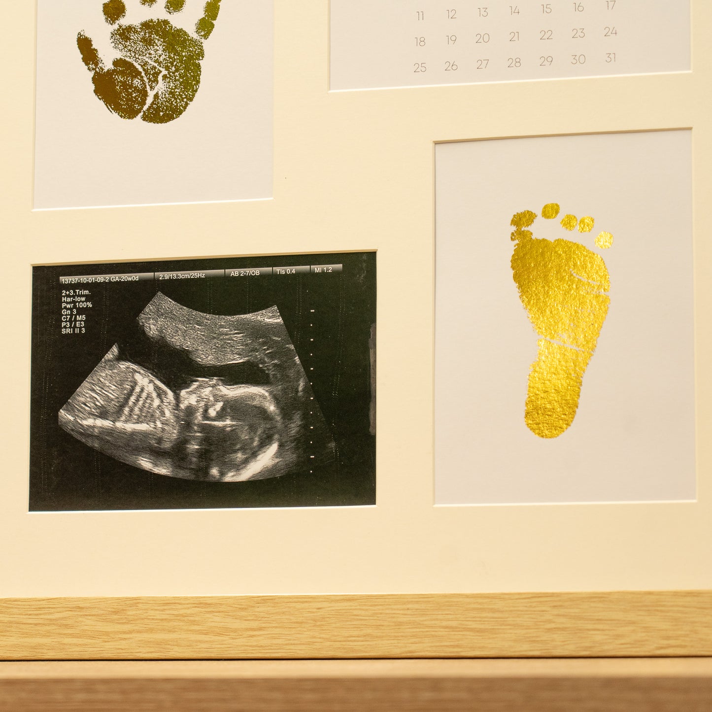Wooden baby photo frame displaying ultrasound scan with gold foil hand and foot prints nursery decor