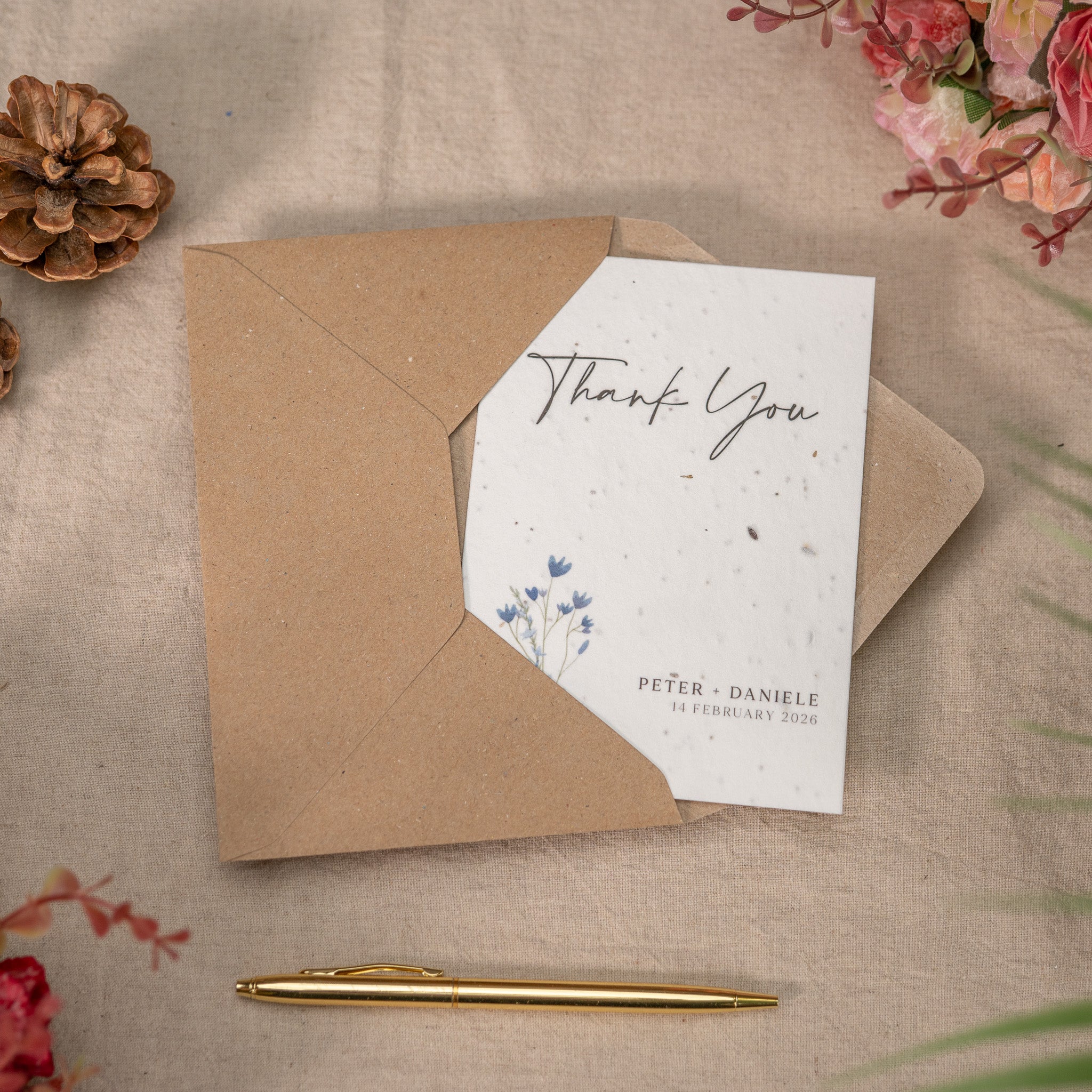 Neutral aesthetic wedding thank you cards with soft greenery design on plantable paper