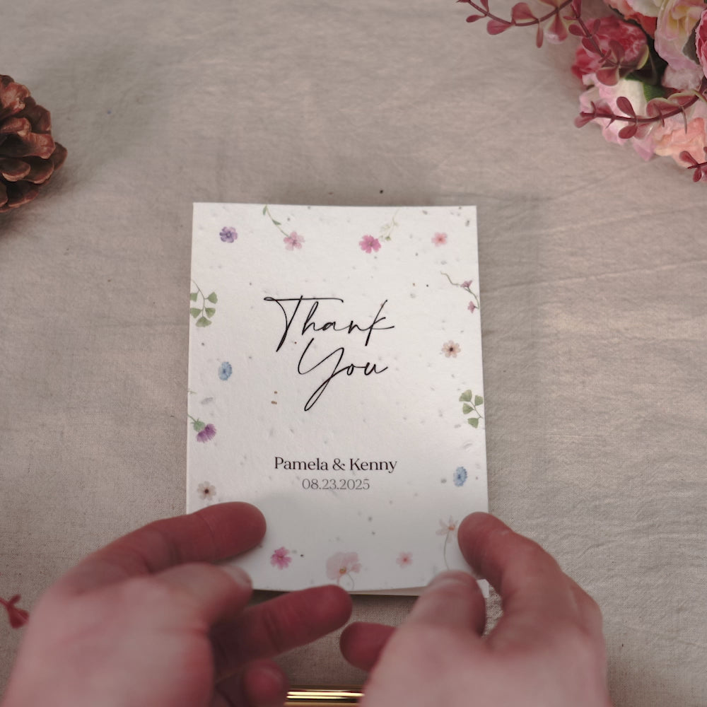 Load video: Eco-conscious wedding thank you notes with plantable paper and natural fibres visible